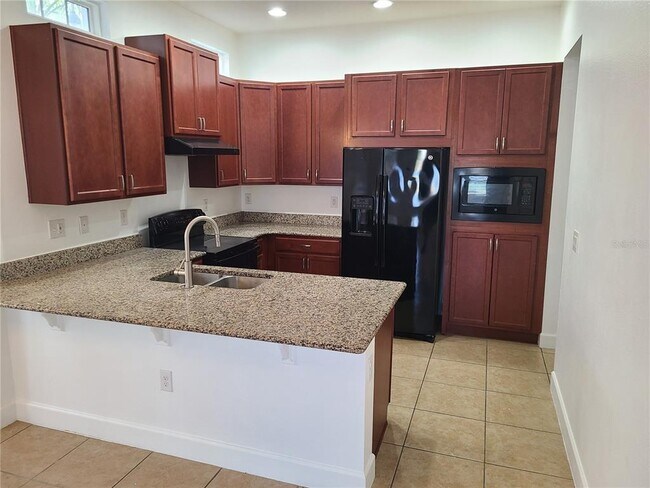 Building Photo - 13825 Benavente Ave