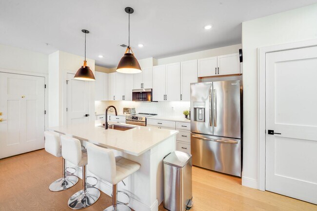 Building Photo - Chic Fully Furnished Condo with Private Retreat-Style Primary Suite