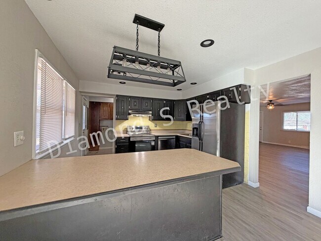 Building Photo - Charming 3 Bedroom Home with HUGE Shop!