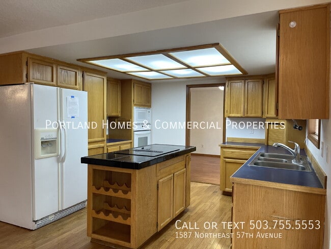 Building Photo - 1587 NE 57th Ave