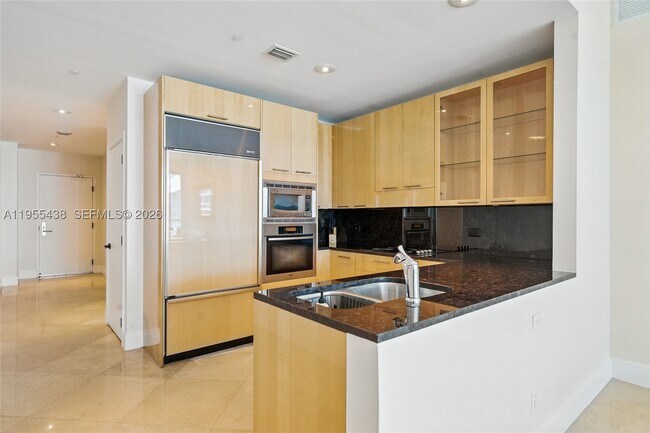 Building Photo - 6799 Collins Ave