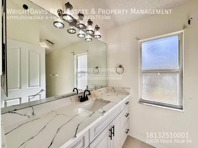 Building Photo - 10028 Oasis Palm Dr