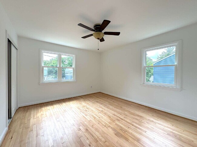 Building Photo - Charming 2BR Townhome with Finished Basement, Fenced Yard & Private Driveway Near Huntington Metro