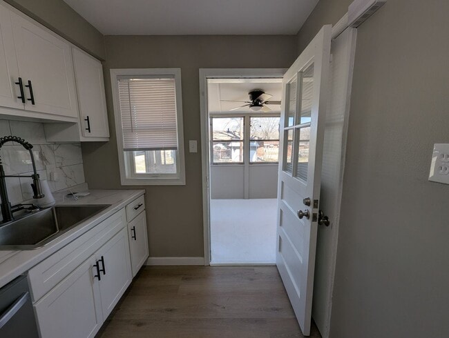 Building Photo - Fully Renovated Home with Sunroom, Garage & Huge Fenced Yard