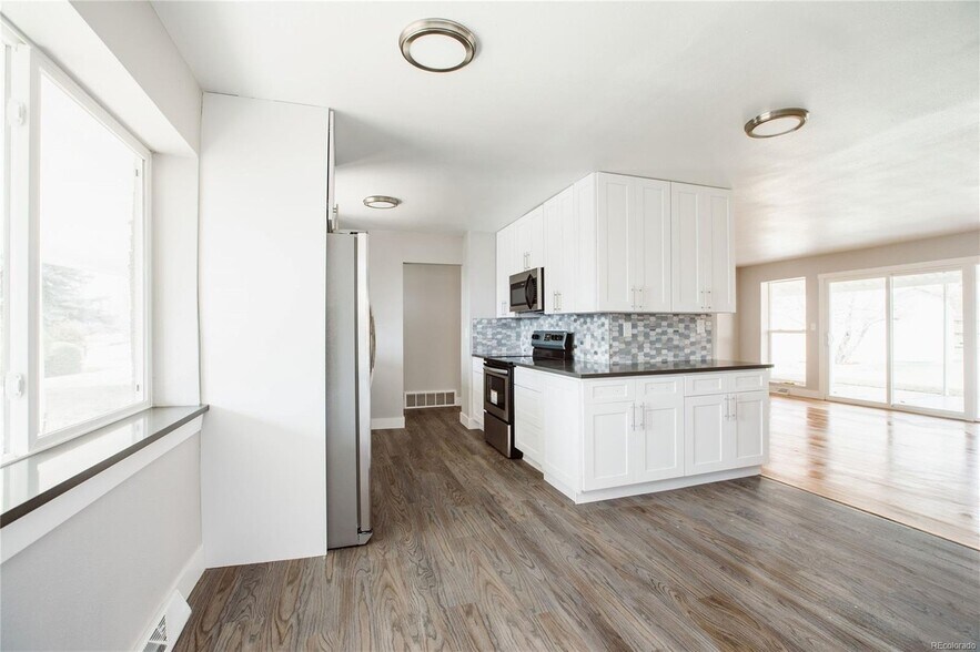 Upstairs Unit Kitchen - 165 W Midway Blvd