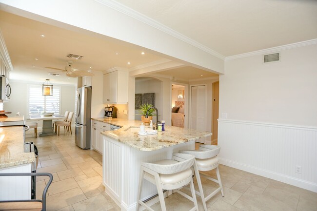 Building Photo - Live the Naples Lifestyle – Elegant 2BR/2B...