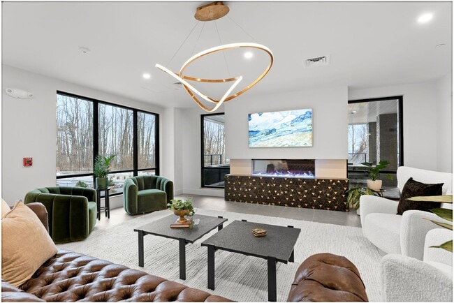 Building Photo - ONE25: Pet-Friendly 1-Bed with Balcony, Do...