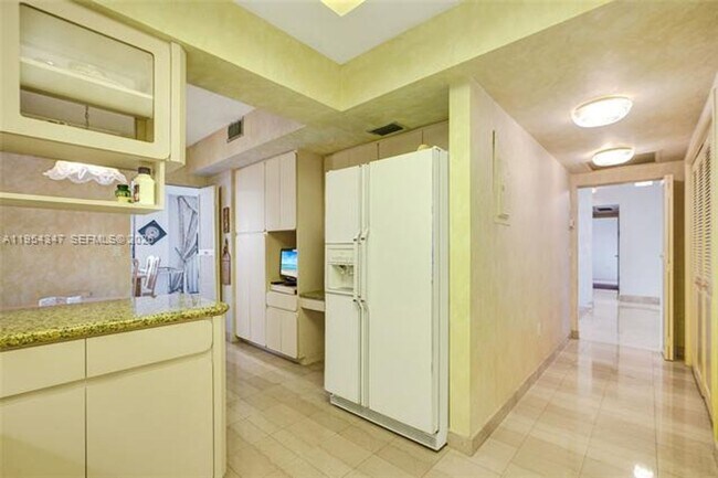 Building Photo - 9801 Collins Ave