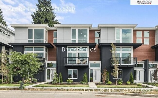 Building Photo - Move-In Ready Townhome with Ground Floor Suite & Views of Olympic Mountains