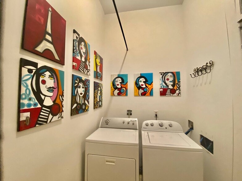 common laundry in the hallway - 117 W Harrison Ave