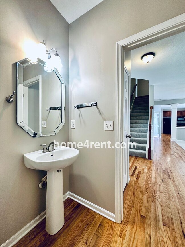 Building Photo - Wood Floors, Open Layout, Plenty of Natura...