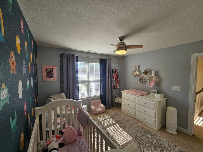 Building Photo - GRASSFIELD - Lauren's Cove