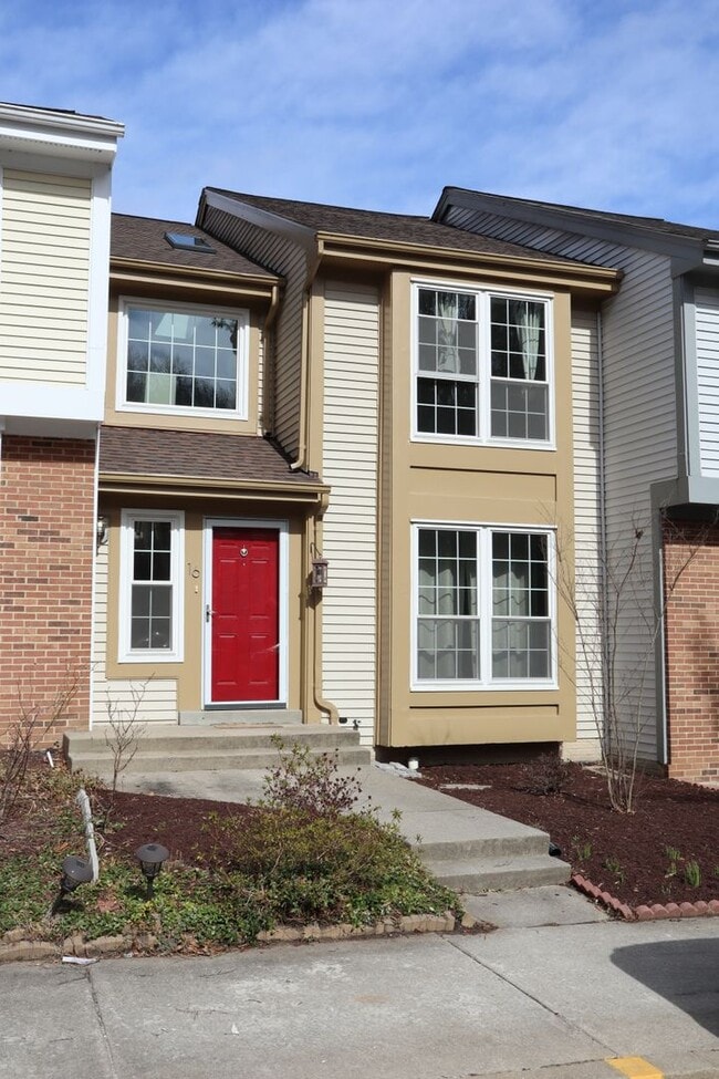 Primary Photo - Charming Townhome Nestled in a Private Cul...