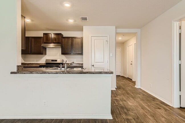 Building Photo - HALF OFF First Month Rent located near Lac...
