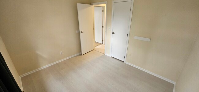 Front Bedroom. Please note that rooms are larger than they appear due to how I photographed them. - 578 Tyler St