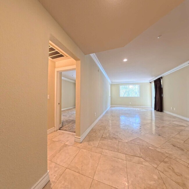 Building Photo - Luxury Mid-Rise | Guard Gated | Underground Garage Area | Resort Style Amenities