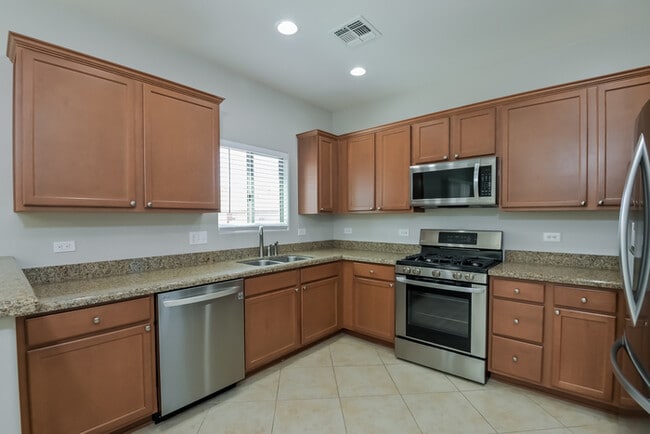 Building Photo - Inviting 4-Bedroom Home with Community Amenities