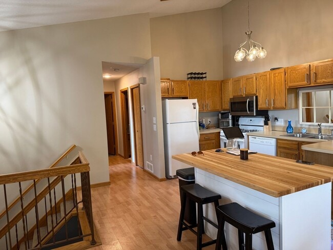 Building Photo - Two Bedroom Townhouse W/ Views Of Rice Lak...