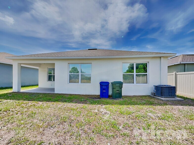 Building Photo - 5765 Arlington River Dr.
