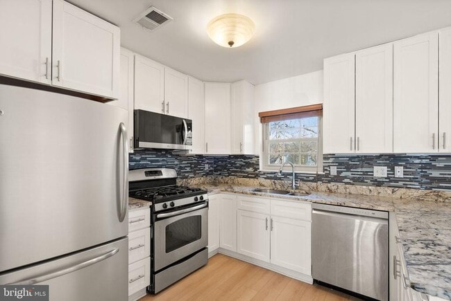 Building Photo - 7829 Mt Woodley Pl