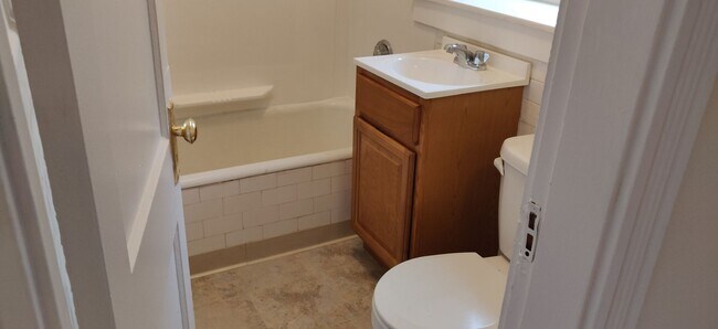 Building Photo - No Brokers Fee, No Security Deposit, Heat, Hot Water Included, Laundry on a Site