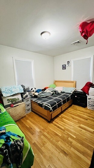 Main level bedroom with hardwood floors - 76 Eleanor St