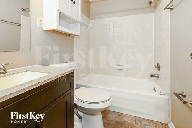 Building Photo - 6811 Abelia Hill Cove