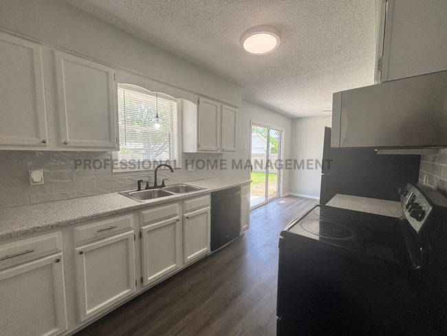 Building Photo - Welcome to your beautifully renovated 4-be...