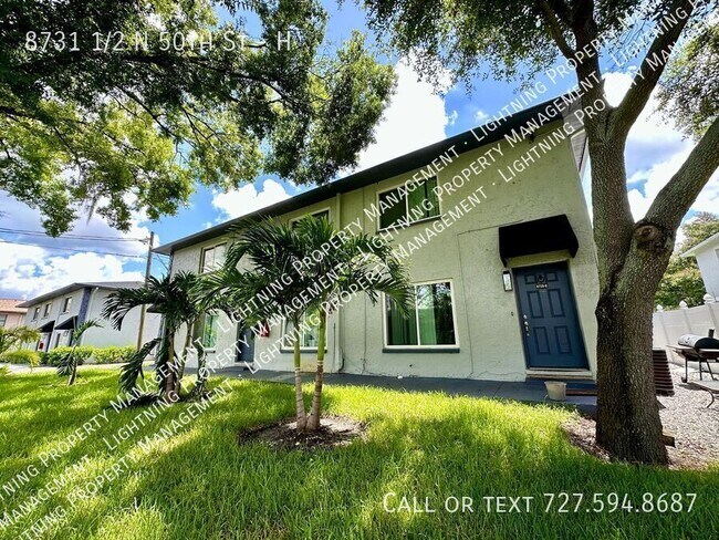 Building Photo - 8731 1/2 N 50th St-H