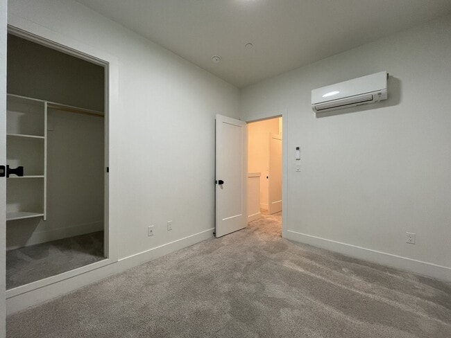 Building Photo - Modern 2-Bed, 1.5-Bath Condo with Custom Kitchen, Private Patio, and Prime Location