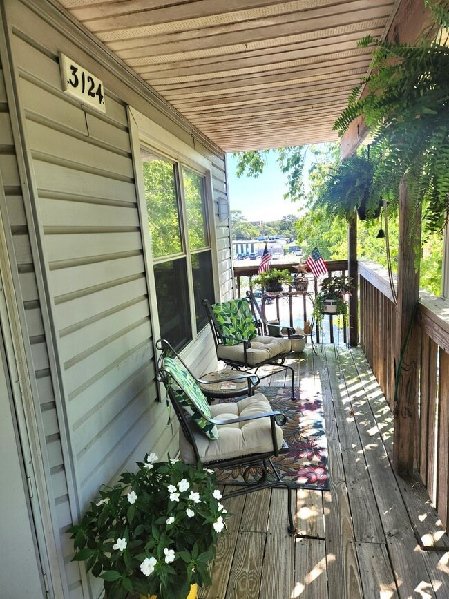 Primary Photo - Top floor, corner unit condo off Shore Dri...