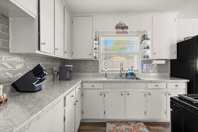 Building Photo - Move-In Ready 3BR Brick Ranch — Roof, HVAC, Furnace & Water Heater All Updated 2021-2024
