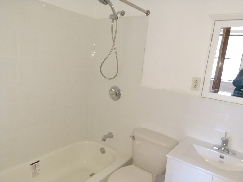 Updated bathroom fixtures - 240 E 23rd St