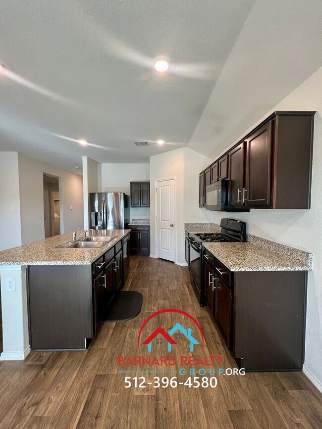 Building Photo - Available August 8: Four Bedroom House on Corner Lot