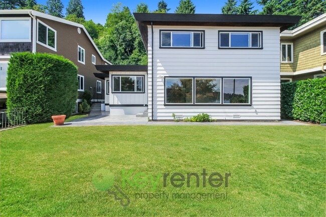 Building Photo - Waterfront Elegance with Private Dock and Designer Finishes