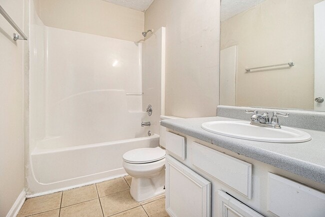 Building Photo - Rare Find: 4 Bedroom + 3 Bathroom + 2-Car ...