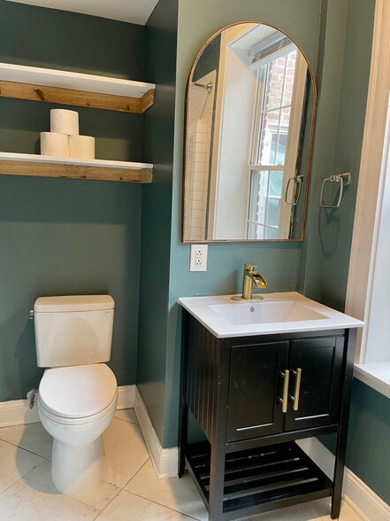 Bathroom sink/toilet area - 140 W Clay St