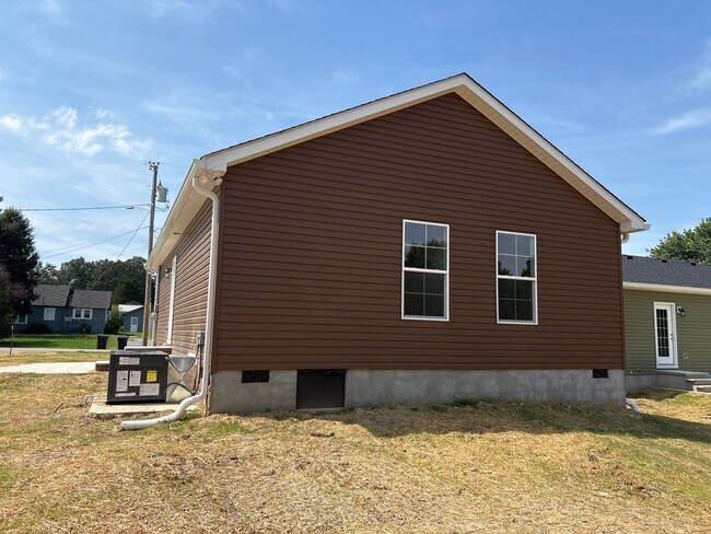 Building Photo - Charming New Home with a Rocking Chair Front Porch!