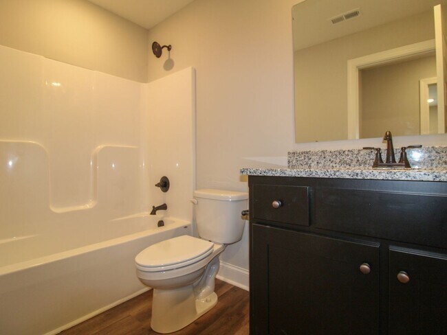 Building Photo - 4 BR - 3 Baths -  Cable, Internet & Lawn-care and Pest Control Included!