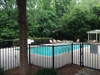 Building Photo - Lovely Condo in Gated Community at Brookwo...