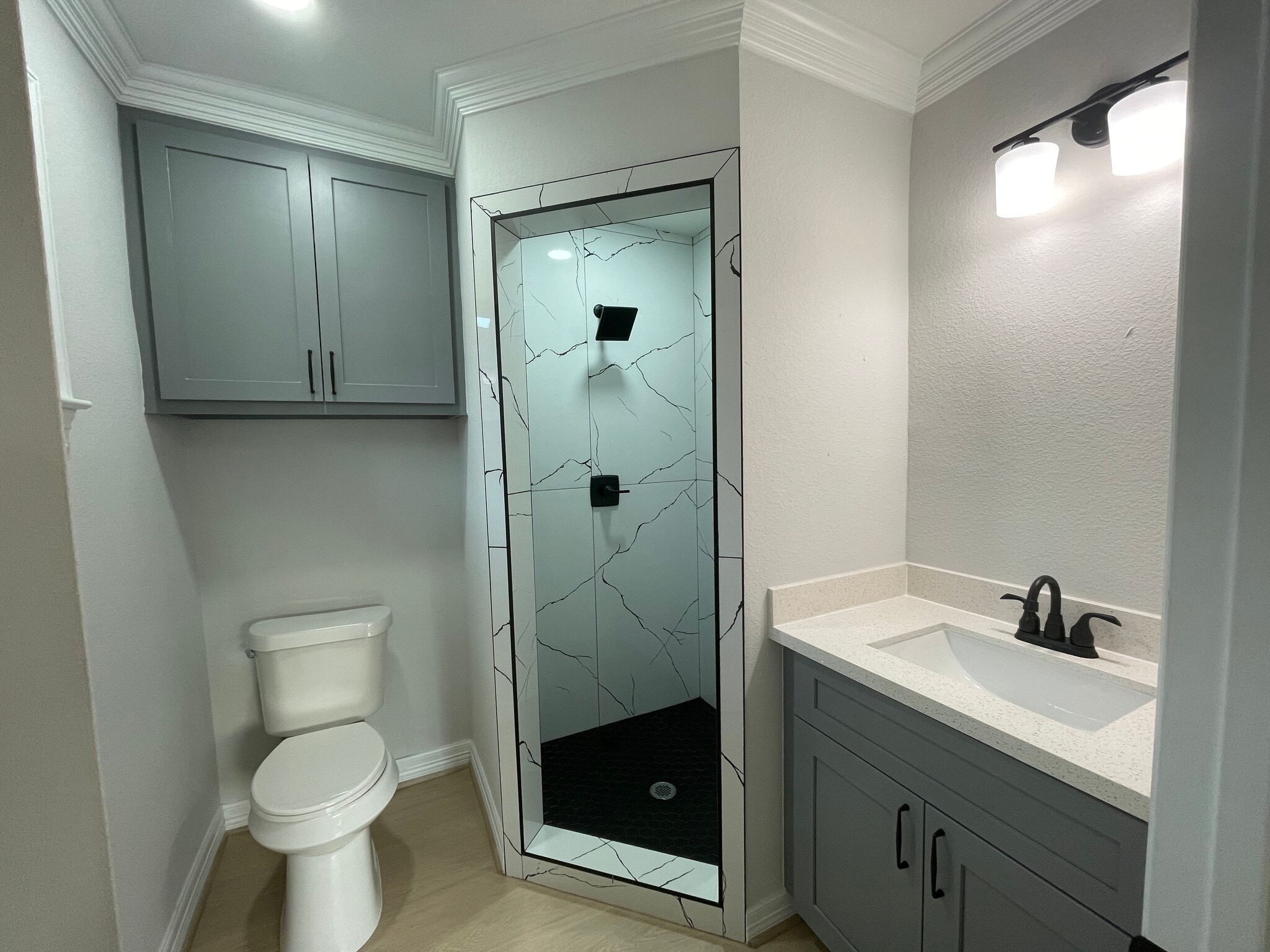 Primary bedroom bathroom (shower door is now installed, not shown in picture) - 7022 Fondren Rd
