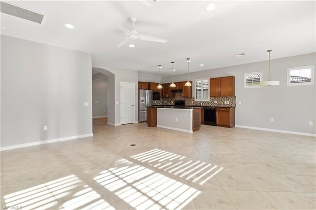 Building Photo - 6068 Triumph Ln