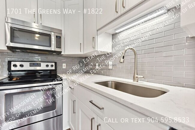 Building Photo - 1701 The Greens Way