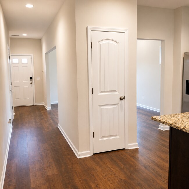 Building Photo - 4BR Home with Community Pool & Modern Finishes!