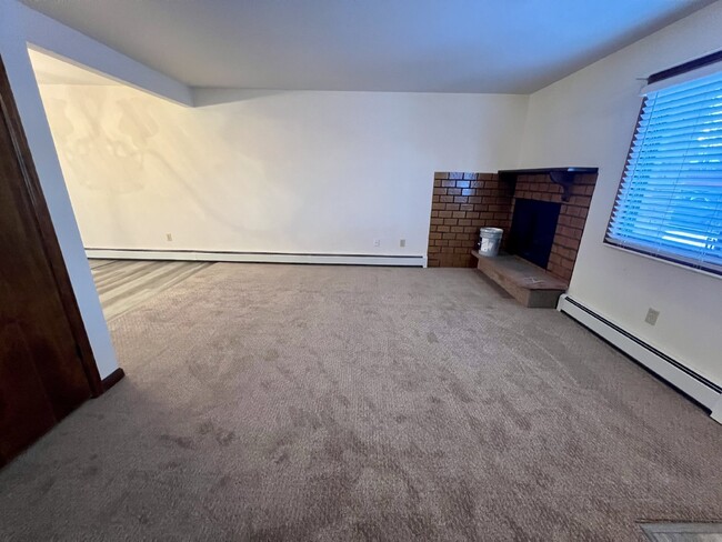 Building Photo - "Cozy 2-Bed Condo with Fireplace Oasis in ...