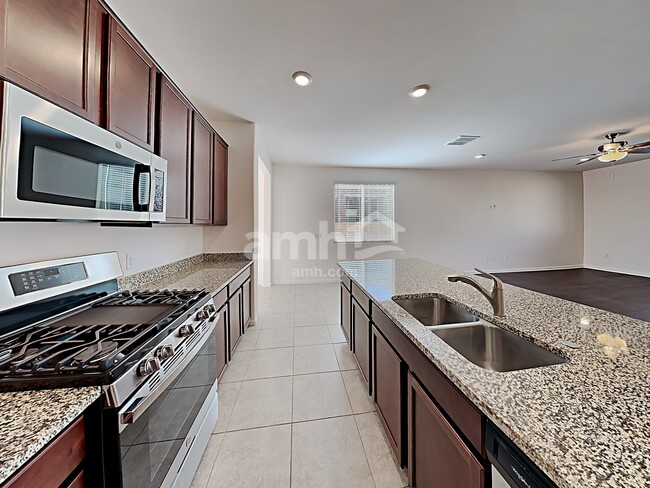 Building Photo - 6872 Corte Casa Elegante