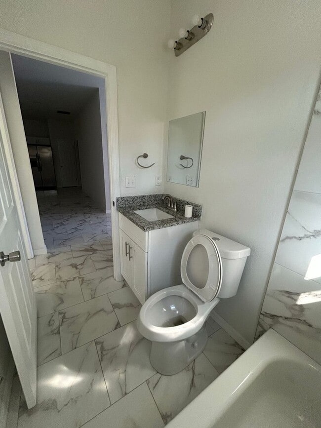 Building Photo - SPACIOUS 4 BEDROOM- 2 BATHROOM RETREAT IN BEAUTIFUL LAKE PLACID