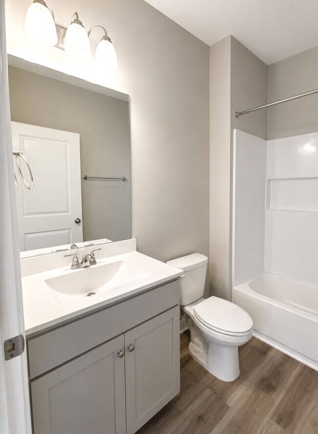 Building Photo - First Floor Comfort Meets Picture Perfect Pond Views
