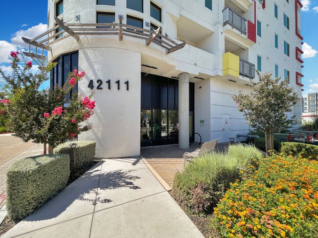Building Photo - Modern 2BD Fremont Condo – EV Charger, Balcony, & Walk to BART
