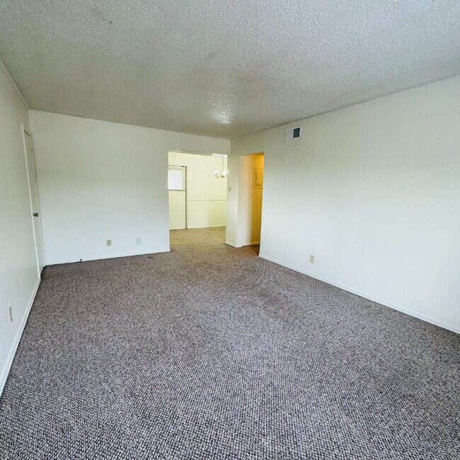 Building Photo - Inviting Townhome at Maison Helena Townhomes in Nederland, TX